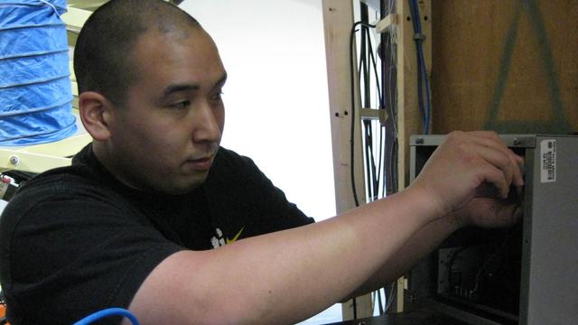 James wiring a panel for a game show.